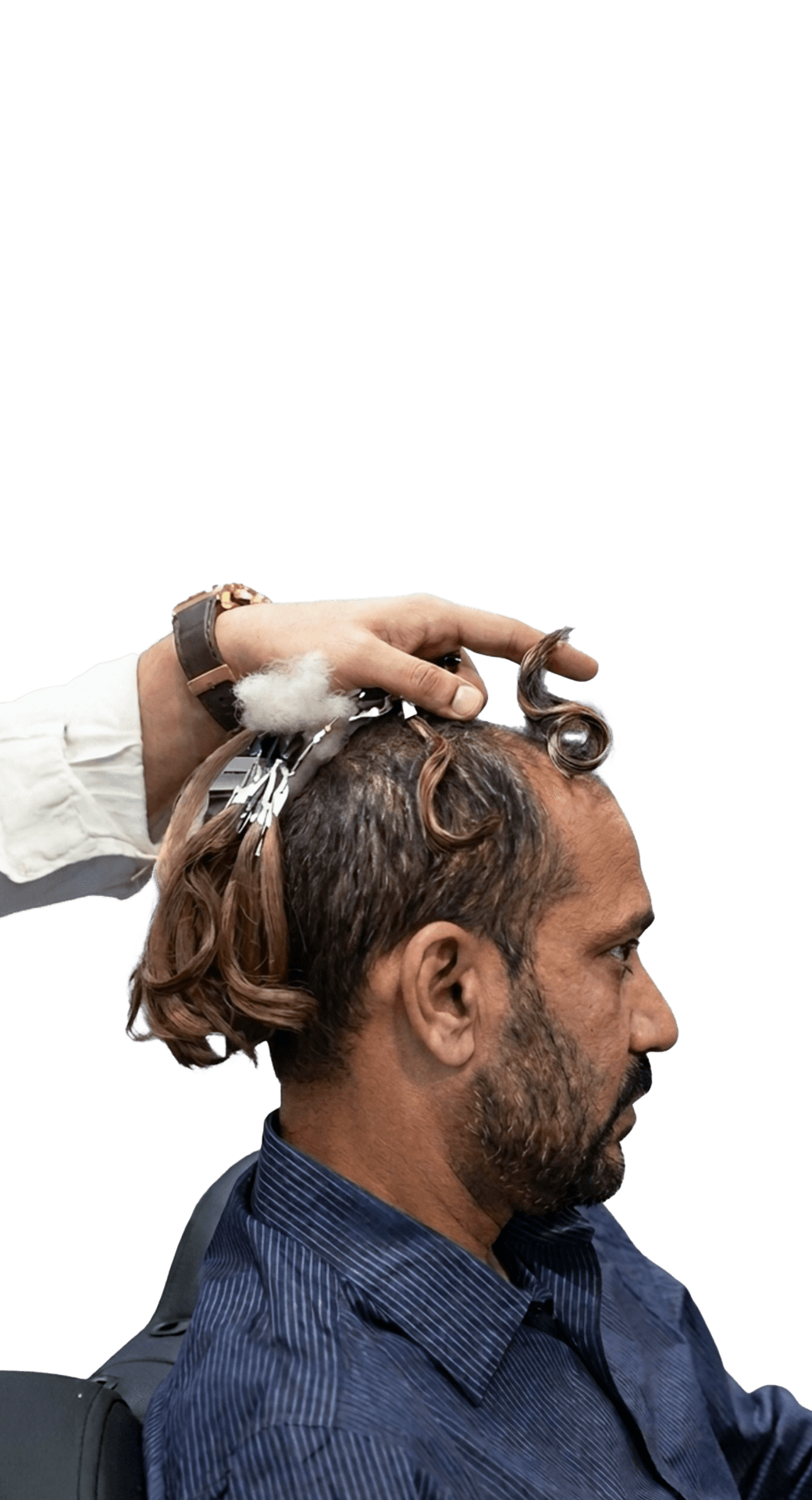 Mobile consultation step showing a specialist designing a custom stick-on hair system.